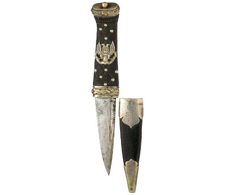 Scottish. Skein DhuA good example with clipped back steel blade and ebonised interlaced Celtic design grip mounted with white