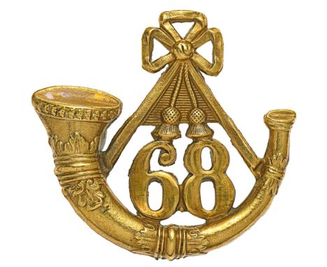 68th (Durham Light Infantry) Regiment OR’s glengarry badge circa 1874-81.A good die-stamped brass example. Strung bugle horn 