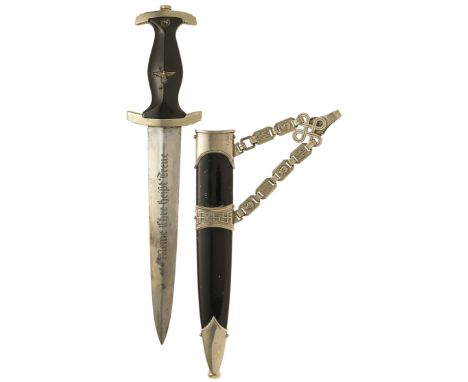 German Third Reich SS Model 1936 chained dagger.A good scarce parts example.  The plated double edged blade bears etched mott