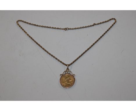 An 1897 full Sovereign in yellow metal mount, hung to a 9ct gold chain, approx. 17.5gms total weight 