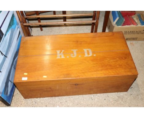A wooden travelling trunk  AF, initialled to lid K.J.D. with carrying handles 