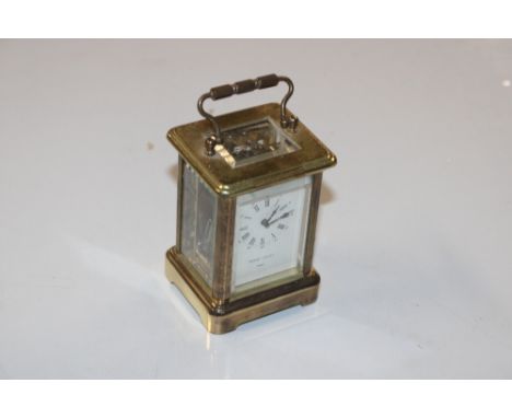A Pierre Jacot brass cased carriage clock with key