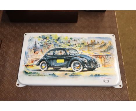 An enamel plaque decorated with a Volkswagen Beetle 