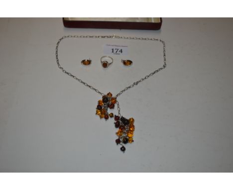 A Sterling silver belcher link chain with amber beads; a pair of ear rings and ring size M/N