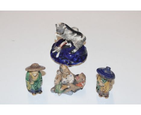Three Chinese pottery Mudmen and a Staffordshire style model of a goat