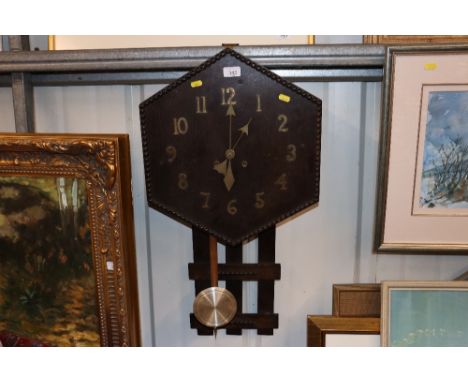 An Art Deco oak wall clock