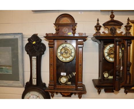 A Victorian walnut and inlaid regulator type wall clock