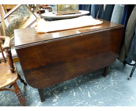 A MAHOGANY DROP FLAP DINING TABLE ON BLIND FRET CARVED SQUARE SECTIONED LEGS