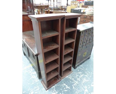 A PAIR OF MAHOGANY SIX SHELF CD RACKS