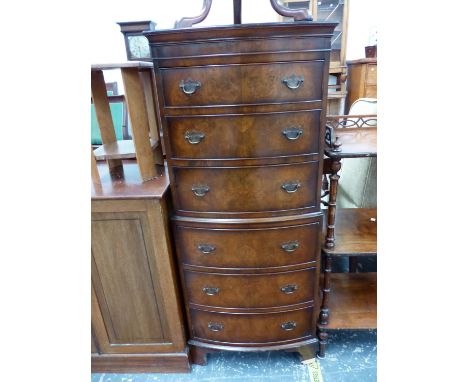 A MAHOGANY TRIPOD TABLE, AN EBONY LINE INLAID MAHOGANY TWO DOOR CABINET AND A MAHOGANY BOW FRONT CHEST ON CHEST OF SIX DRAWER