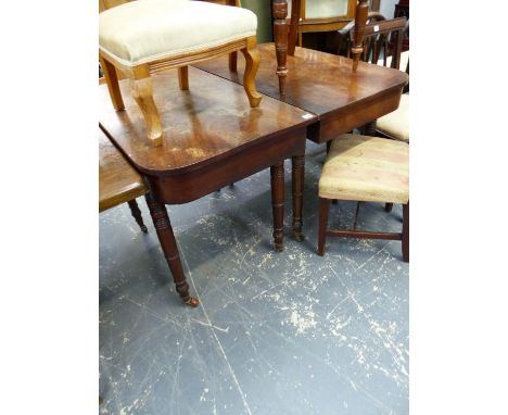 A 19th C. MAHOGANY DINING TABLE ON TURNED LEGS WITH BROWN CERAMIC CASTOR FEET