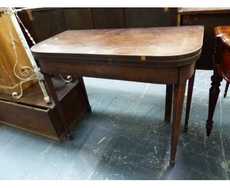 A GEORGE III LINE INLAID MAHOGANY GAMES TABLE OPENING ON SINGLE GATE