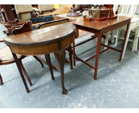 A MAHOGANY RECTANGULAR TABLE TOGETHER WITH A MAHOGANY DEMILUNE GAMES TABLE OPENING ON A DRAW OUT LEG