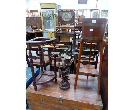 A MAHOGANY TRIPOD PLANTER, A CHINESE WOODEN FIGURE SUPPORTED FOUR LIGHT PRICKET CANDLE STICK AND A MAHOGANY STICK STAND