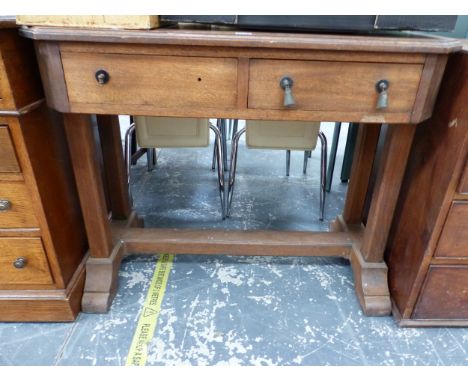 AN ARTS AND CRAFTS OAK TWO DRAWER TABLE