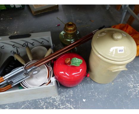 COOKING POTS, STORAGE CROCKS, AN OIL LAMP AND TWO SHOOTING STICKS