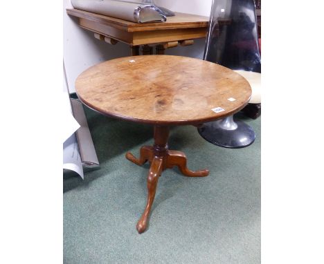 A MAHOGANY CIRCULAR TILT TOP TRIPOD TABLE.   Dia. 64 x H 61cms.