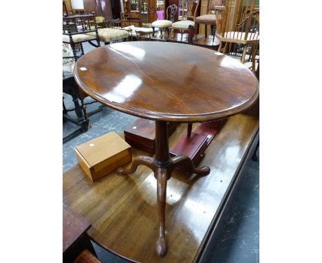 AN ANTIQUE MAHOGANY BIRDCAGE TILT TOP TABLE.