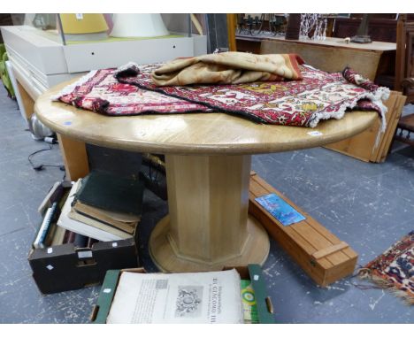 AN OAK CIRCULAR TABLE ON HEXAGONAL COLUMN AND ROUND PLINTH.   Dia. 120cms.