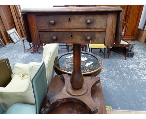 A MAHOGANY FLAP TOP TWO DRAWER TABLE ON BALUSTER COLUMN AND FOUR SCROLL FEET