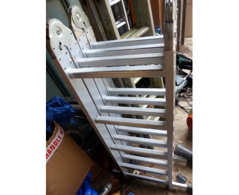 AN ADJUSTABLE LADDER