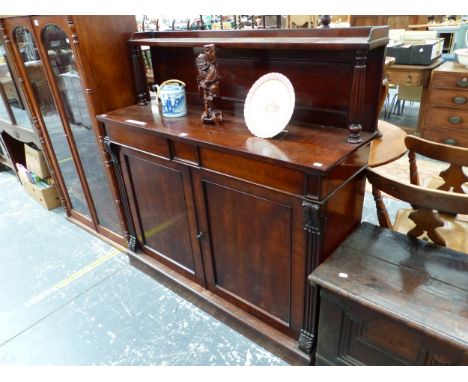 A MAHOGANY CREDENZA SIDEBOARD, THE SHELF BACK RECESSED ABOVE TWO DRAWERS AND TWO DOORS BETWEEN REEDED PILASTERS.   W 125 x D 