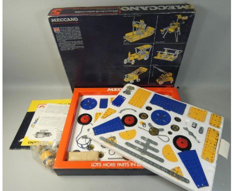 A boxed Meccano Tri-ang construction set, '395 parts for all-action models', appears mostly complete, together with a generat