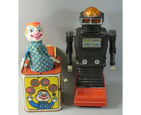 A vintage battery operated robot made in Japan, together with a Mattel tinplate Jack-In-The-Music-Box, c. 1968 (2). 