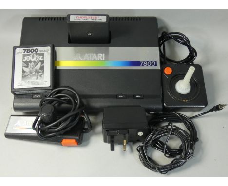 An Atari 7800 video games console, together with power supply unit, 2 x 7800 cart games; Choplifter! and Joust, preloaded Ast