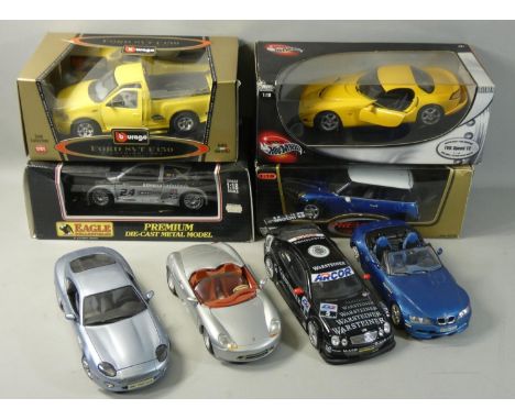 A collection of boxed and unboxed die-cast model vehicles by Maisto, Bburago and others, to include Hot Wheels TVR Speed 12, 