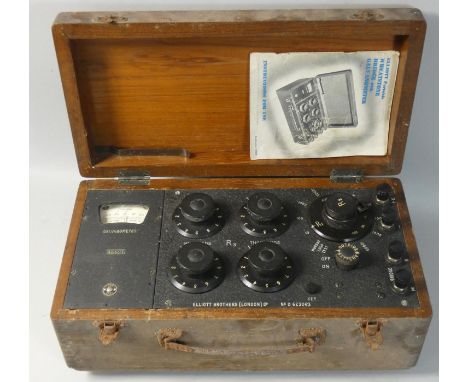 An oak cased wheatstone bridge with galvanometer, by Elliott Brothers (London) Ltd, No. 623063, with instructions. 