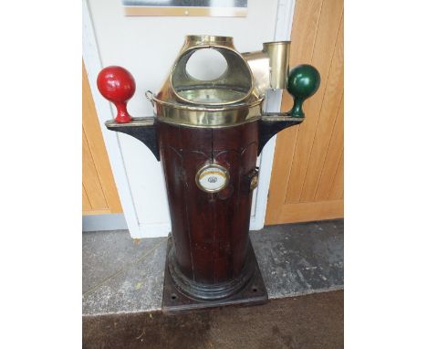 A LATE VICTORIAN SHIPS BINNACLE WITH COMPASS, the mahogany base with brass outriggers for port and starboard, brass inclinome