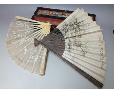 AN ORIENTAL BONE FAN WITH PAINTED AND SEQUIN DECORATION, with sixteen sticks and two guard sticks formed of bone, carved in l
