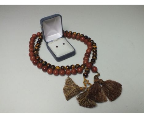 A PAIR OF 10K GOLD SMALL AMETHYST EARRINGS, together with a goldstone bead necklace and a similar tigers eye bead necklace (3