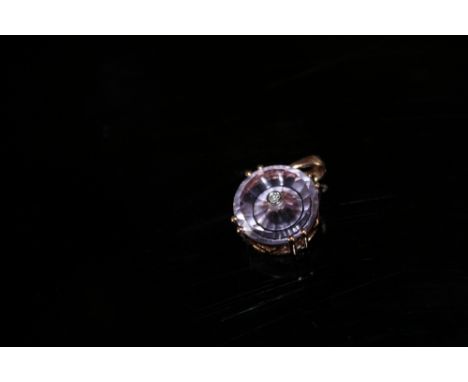 A HALLMARKED 9K ROSE GOLD PINK AMETHYST AND DIAMOND PENDANT, the amethyst is 6.92 carats measuring 14 mm x 14 mm, weight of g