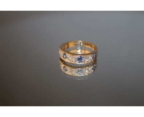 A HALLMARKED 9 CARAT GOLD SAPPHIRE AND DIAMOND SEVEN STONE HALF ETERNITY RING, approx weight 3.3g, ring size m 1/2