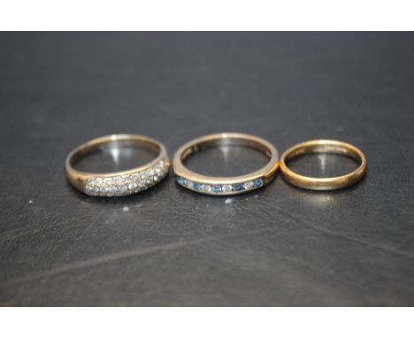 A 9 CARAT GOLD DIAMOND CLUSTER RING TOGETHER WITH A 9 CARAT GOLD HALF ETERNITY RING, and a small hallmarked 22 carat wedding 