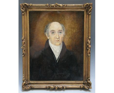 A LATE 19TH / EARLY 20TH CENTURY PORTRAIT MINIATURE OF A GENTLEMAN IN A REDDISH BROWN COAT, in a gold swept frame, unsigned, 