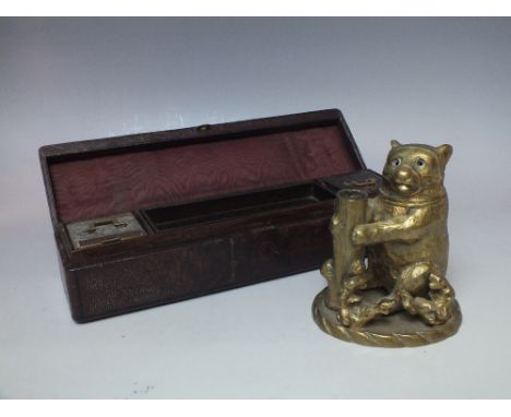 A LATE 19TH / EARLY 20TH CENTURY GILT BRASS VESTA CASE / INKWELL IN THE FORM OF A BEAR, H 10.5 cm, together with a leather ca