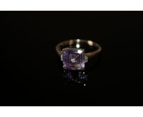 A HALLMARKED 9K GOLD AMETHYST AND DIAMOND RING, the amethyst measuring approx 10 mm x 10 mm ring size R 1/2