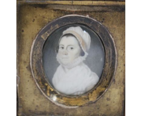 A LATE 19TH / EARLY 20TH CENTURY OVAL PORTRAIT MINIATURE OF A LADY IN A WHITE DRESS AND BONNET WITH A YELLOW RIBBON, in a fru