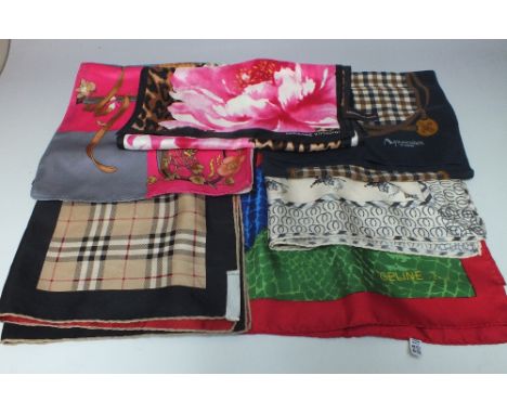 A COLLECTION OF SIX VINTAGE DESIGNER LADIES SCARVES. to include examples by Daks, Burberry, Aquascutum and Celine (6)