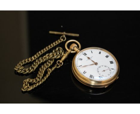 A HALLMARKED 9 CARAT GOLD OPEN FACED MANUAL WIND POCKET WATCH BY BENSON, with base metal chain, Dia 4.75 cm