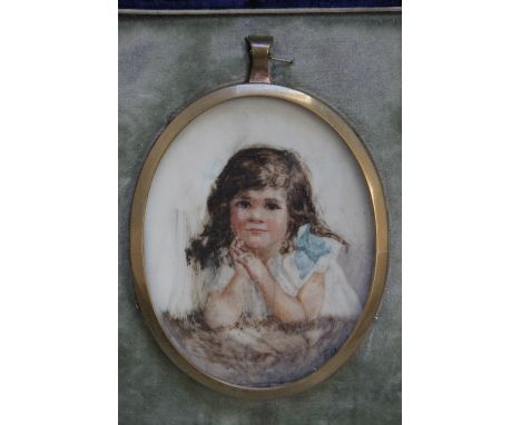A TWENTIETH CENTURY OVAL PORTRAIT MINIATURE OF A YOUNG GIRL, in a gilt metal framed, set in a blue case with a strut back, un