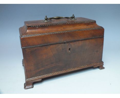 A VICTORIAN WALNUT TEA CADDY, of rectangular form, the hinged lid opening to reveal fitted interior containing two metal cani
