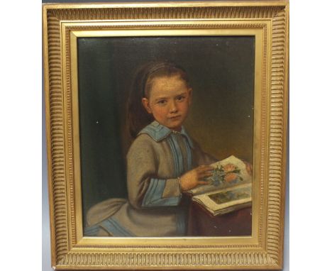 A LATE 19TH / EARLY 20TH CENTURY PORTRAIT STUDY OF A YOUNG GIRL WITH BOOK, unsigned, oil on canvas (relined), framed, 34 x 29