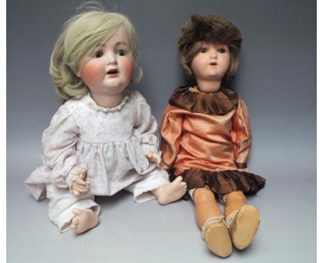 AN EARLY 20TH CENTURY HEINRICH HANDWERCK BISQUE HEAD DOLL, composite body, impressed H.W. Germany 6 1/2 to neck, weighted bro