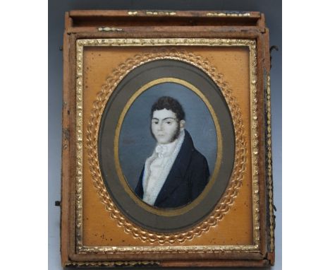 A 19TH CENTURY OVAL PORTRAIT MINIATURE OF A GENTLEMAN IN A BLUE COAT, in gilt surround set in a leather case A/f, unsigned, f