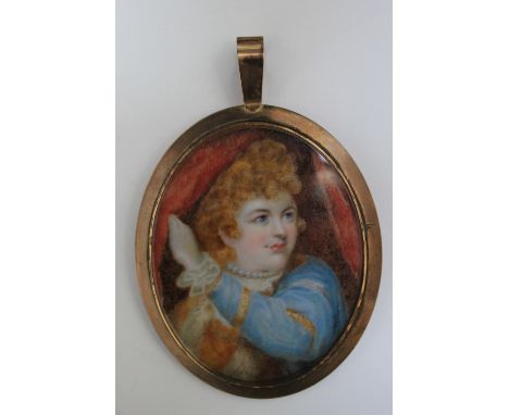 A LATE 19TH / EARLY 20TH CENTURY OVAL PORTRAIT MINIATURE OF A LADY LOOKING THROUGH RED CURTAINS, in an oval gilt frame, unsig