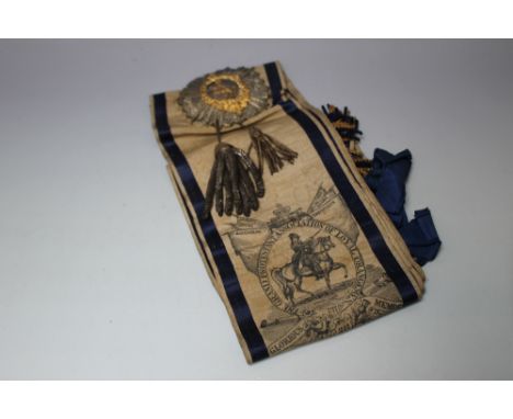 A C19TH CENTURY IRISH ORANGE ORDER BADGE AND SASH
